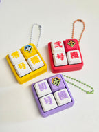 Masa Crafts Studio EVA keycap clicker fidget keychain with colorful, textured surface for tactile sensory stimulation.