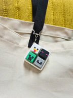 Minecraft Keycap Clicker fidget keychain by Masa Crafts Studio with colorful keycap design and clickable surface.