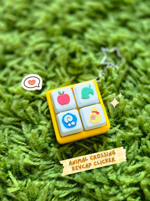 Animal Crossing-themed fidget clicker keychain by Masa Crafts Studio featuring a colorful animal crossing character design.