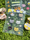 Colorful Meow Sticker Sheet by Masa Crafts Studio featuring playful cat-themed stickers on a white background.